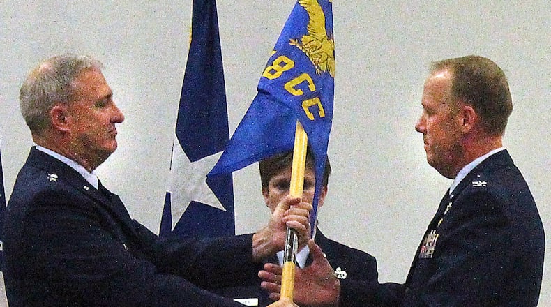 Maj. Gen. Stephen Markovich (left) presides over a change of command ceremony Saturday, where Col. Gregg Hesterman took over leadership of the 178th Wing in Springfield. JEFF GUERINI/STAFF