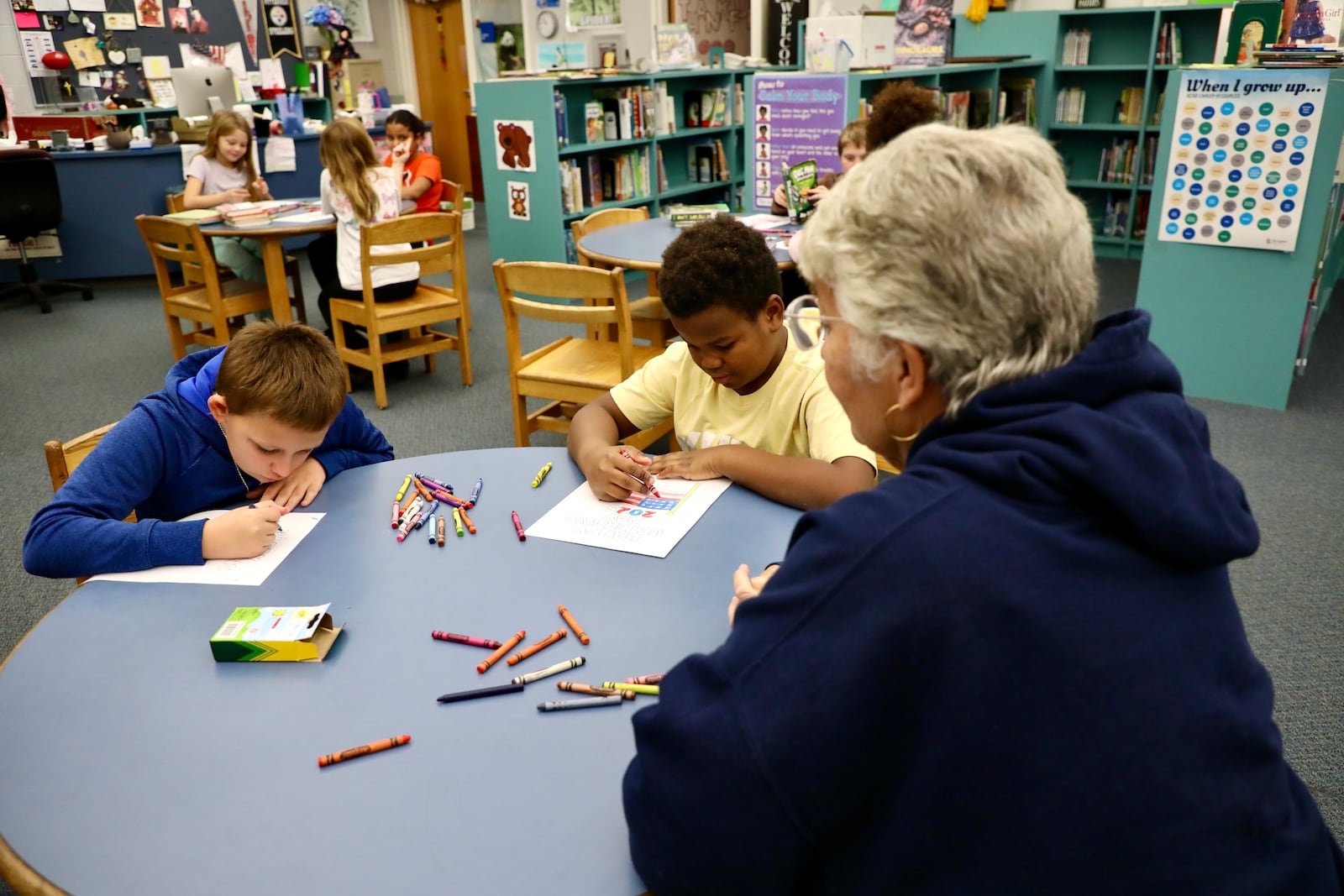 Hundreds of students in the Springfield City School District came together to honor veterans on Veterans Day, Nov. 11, 2025. At Warder Park-Wayne Elementary, students colored patriotic pictures for veterans in the school library. For more than 20 years, Librarian Sheri Ehnie has collected the artwork and delivered it to Springfield restaurants, where veterans dining out on the holiday receive them as a surprise token of thanks. CONTRIBUTED