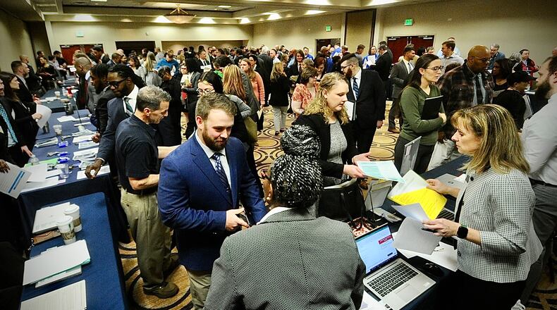 Jobseekers fill the Holiday Inn in Fairborn on Wednesday, March 22, 2023, for the one-day Air Force Life Cycle Management Center hiring event. AFLCMC is based at Wright-Patterson Air Force Base, home to some 35,000 military and civilian employees. MARSHALL GORBY \STAFF