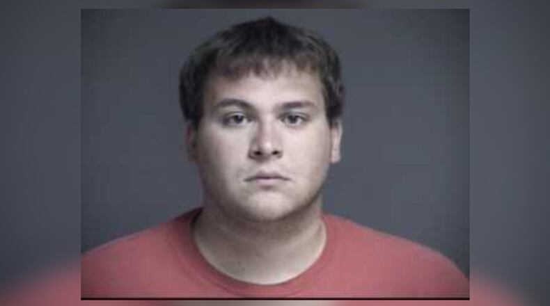 John Austin Hopkins, 25, of Springboro was indicted Monday on 36 counts of gross sexual imposition involving 28 girls under 13 years old in his class at Clearcreek Elementary School in Springboro.
