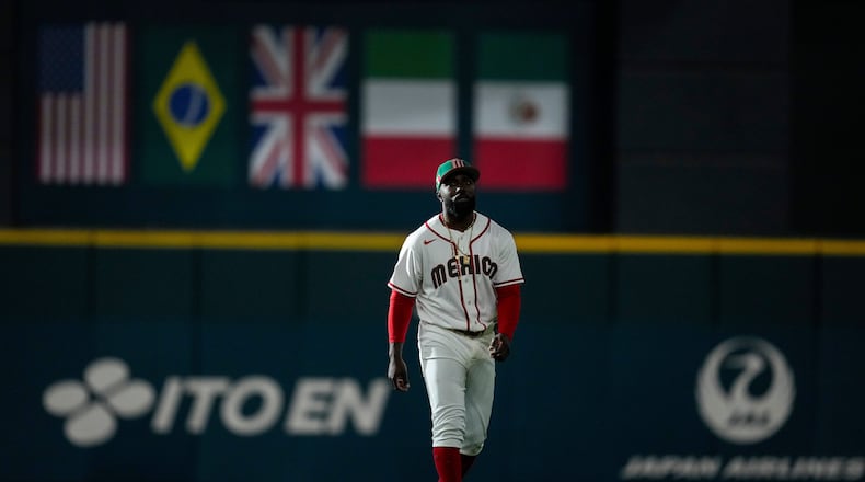 Mexico outfielder Randy Arozarena walks in from the outfield before a World Baseball Classic game against Italy, Wednesday, March 11, 2026, in Houston. (AP Photo/Ashley Landis)