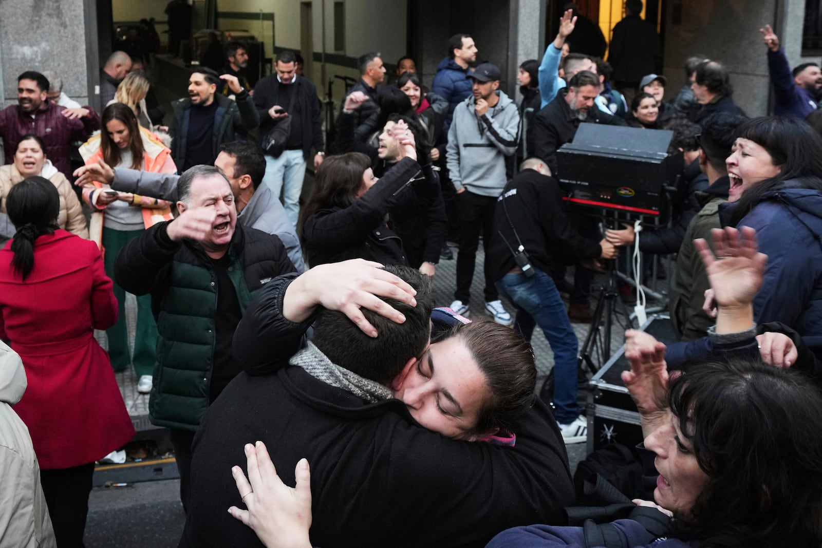 Supporters of former President Cristina Fernandez react after Argentina's Supreme Court upheld her corruption conviction, outside the Peronist Party headquarters in Buenos Aires, Argentina, Tuesday, June 10, 2025. (AP Photo/Rodrigo Abd)
