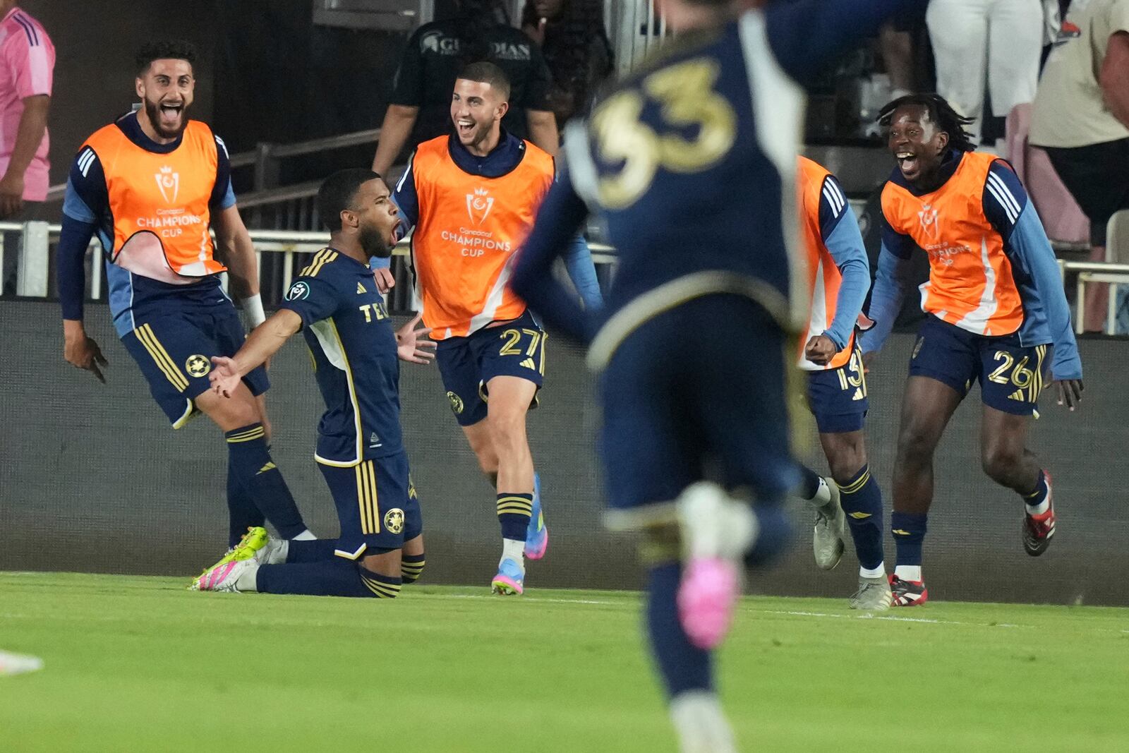 Vancouver Whitecaps midfielder Pedro Vite, second from left, celebrates after scoring a goal during the second half of a CONCACAF Champions Cup second-leg semifinal soccer match against Inter Miami, Wednesday, April 30, 2025, in Fort Lauderdale, Fla. (AP Photo/Lynne Sladky)