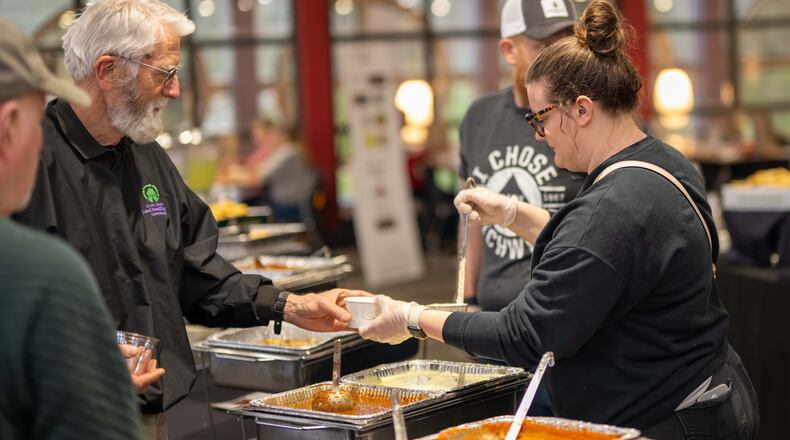 Second Harvest Food Bank will host the 29th annual Empty Bowls fundraising event on April 4. In this photo, attendees receive soup at the 2023 Clark County Empty Bowls. Contributed/Photo by Sarah Babcock.