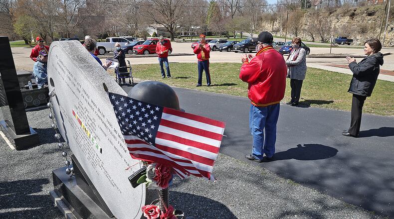 The Daughters of the American Revolution held a small ceremony at Veterans Memorial Park for National Vietnam Veterans Day Monday. BILL LACKEY/STAFF