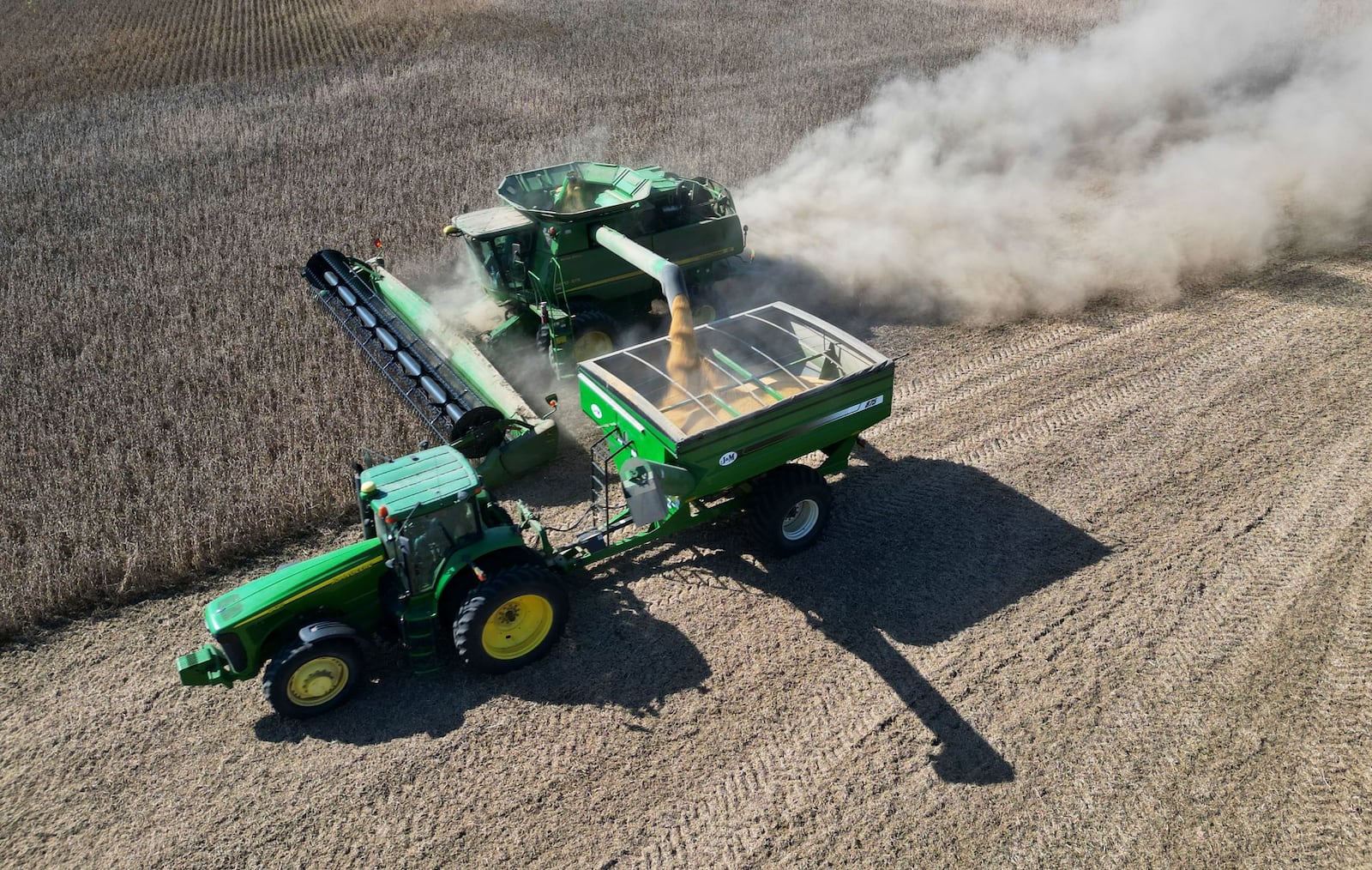 Gary Gerber and crew harvest soybeans in Wayne Twp. in Butler County Monday, Sept. 29, 2025. China has agreed to purchase 25 million metric tons of U.S. soybeans annually for the next three years as part of an agreement reached by its leaders, the Associated Press reported Thursday. NICK GRAHAM/STAFF