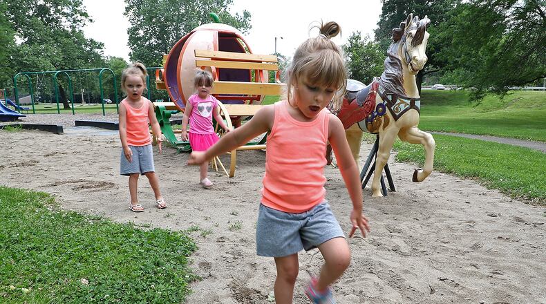 Claire Salser says “She was right here yesterday.” When she and her sisters, Layla and Cleora were asked about the Cinderella statue that was stollen from the Veteran’s Park playground Thusday. Bill Lackey/Staff