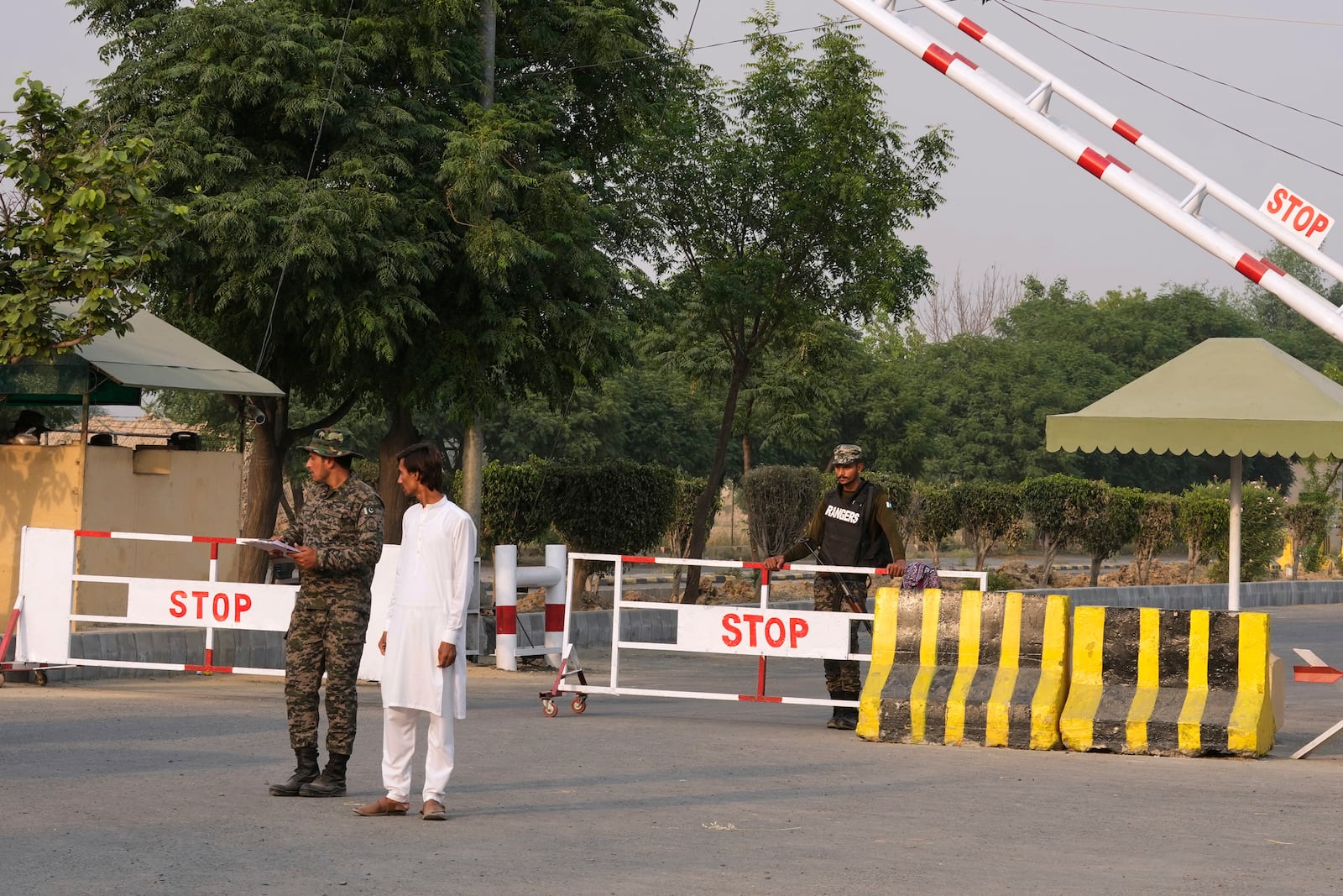 Pakistani paramilitary soldiers stand guard at a checkpoint in Wagah, a joint border crossing point on the Pakistan and India border, near Lahore, Pakistan, Wednesday, April 30, 2025.(AP Photo/K.M. Chaudary)