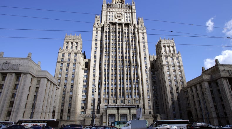 FILE -The main building of Russia's Foreign Ministry dominates the skyline in downtown Moscow, Aug. 16, 2006, with a Soviet Union state emblem on the facade. (AP Photo/Mikhail Metzel, File)