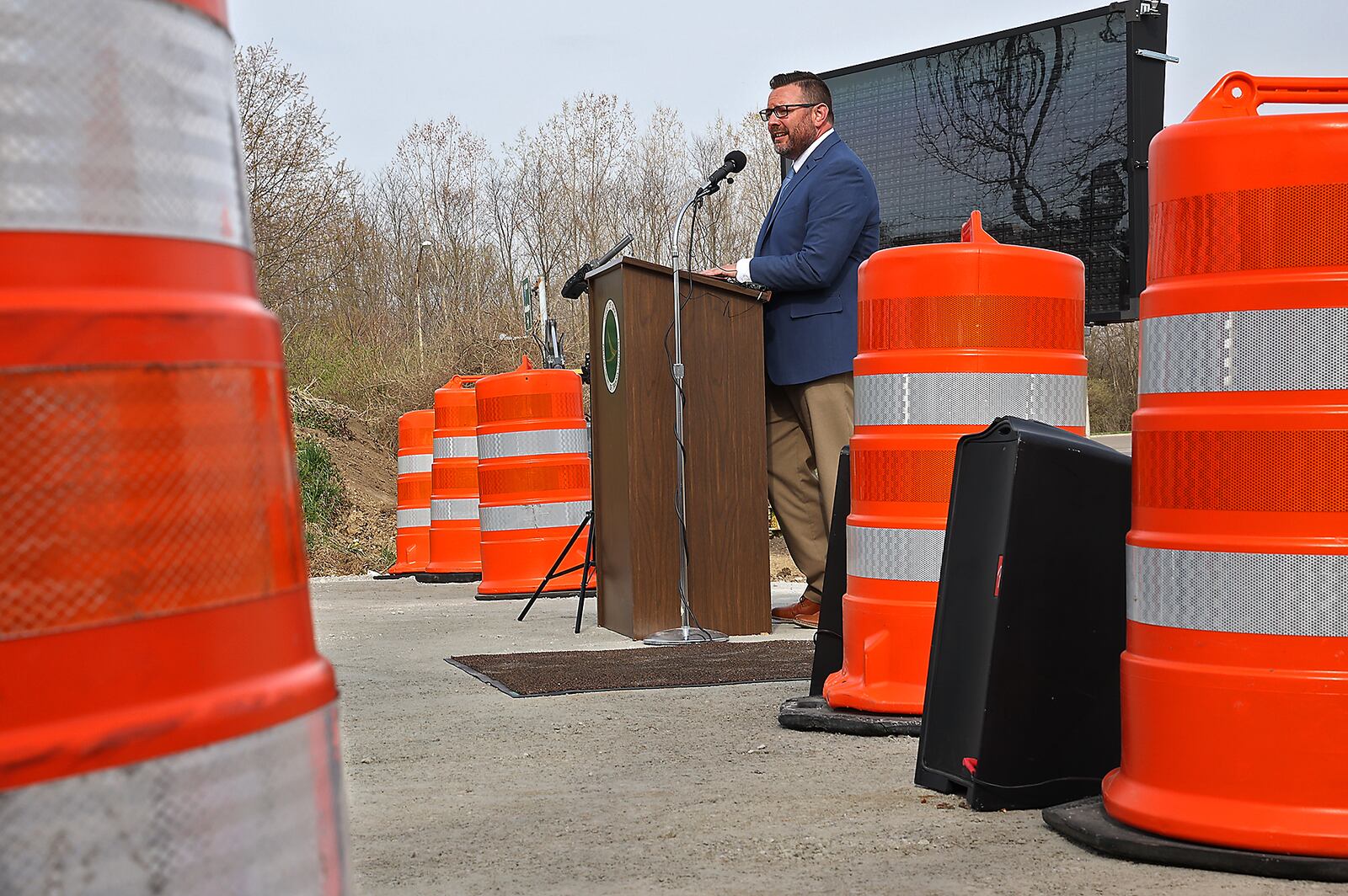 Joshua Bowman, ODOT District 7 construction engineer, talks about all the construction projects on the District 7 roadways Tuesday during the 2021 ODOT Construction Season Kickoff in Springfield. BILL LACKEY/STAFF