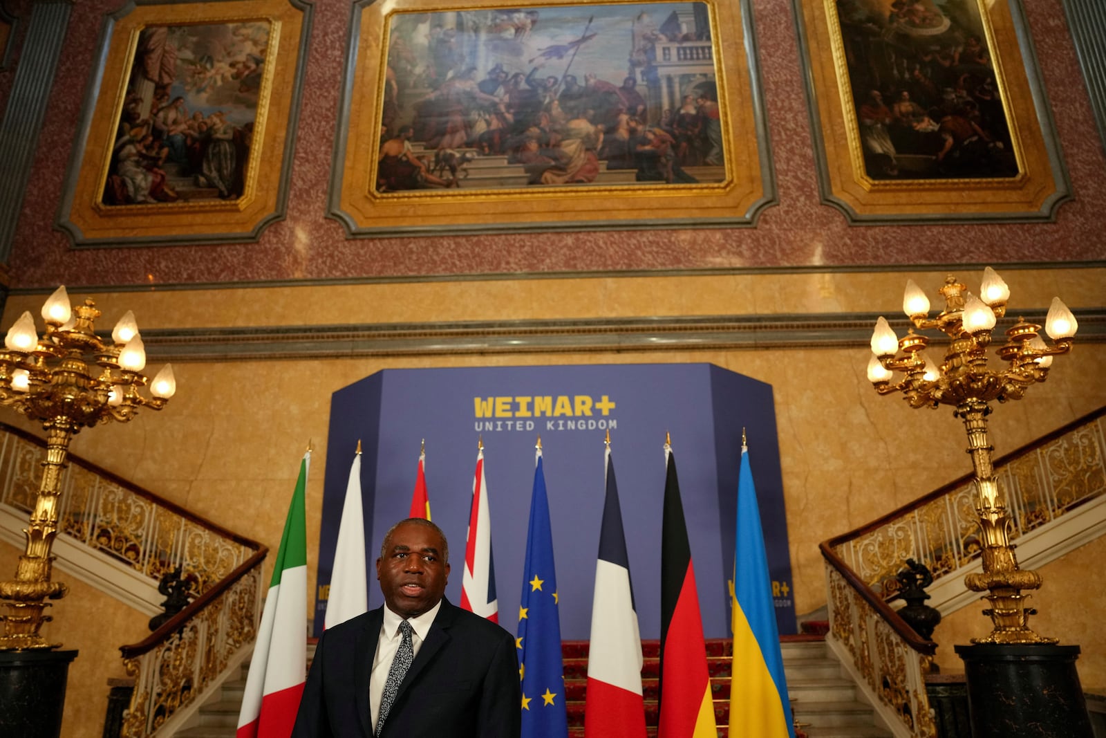 Britain's Foreign Secretary David Lammy speaks to the media as he hosts talks on Ukraine and the future of European security, at Lancaster House in London, Monday, May 12, 2025. (Carlos Jasso/Pool Photo via AP)