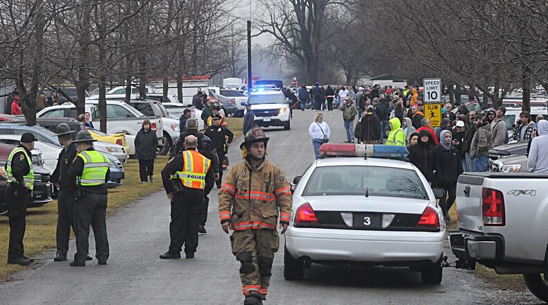 Parents wait to at Lions Park in West Liberty to pick up the children after a shooting at West Liberty-Salem Schools in Champaign County. Marshall Gorby/Staff