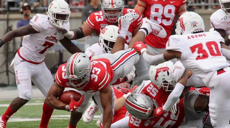 Ohio State’s Master Teague runs against Florida Atlantic on Saturday, Aug. 31, 2019, at Ohio Stadium in Columbus. David Jablonski/Staff