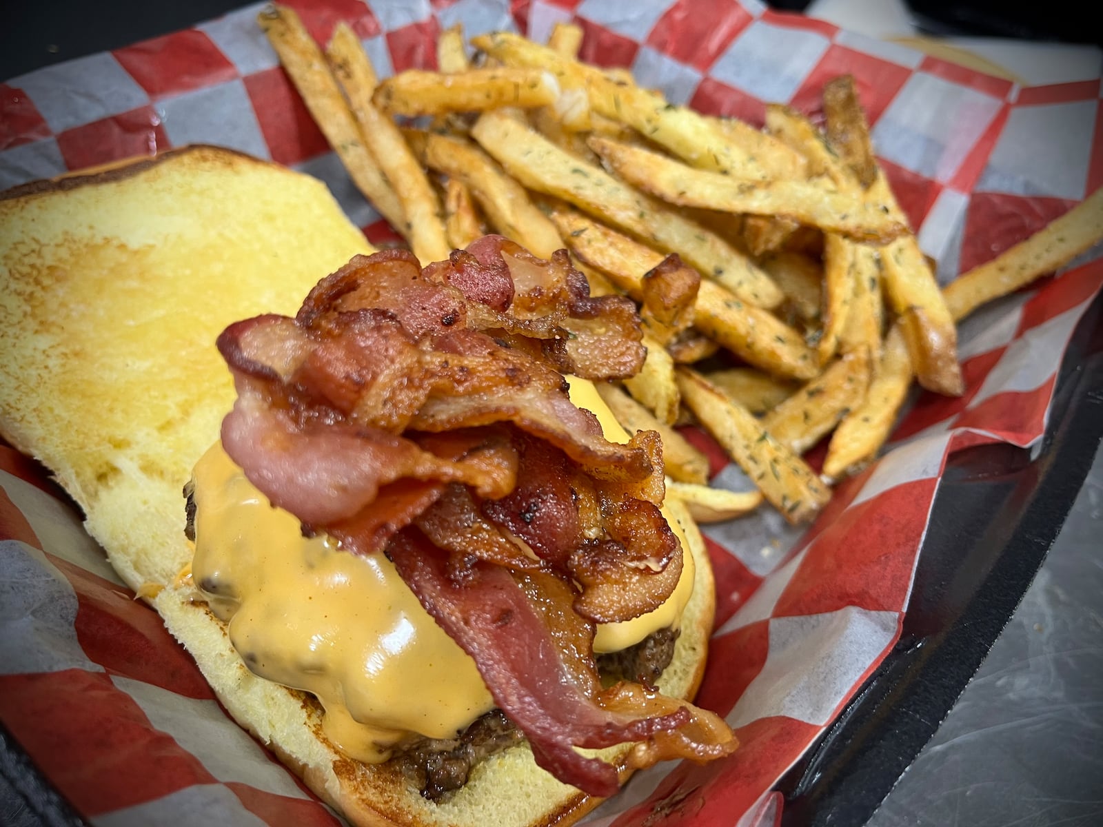 Roots Burgers & Fries is one of six vendors inside The Social at Piqua Center. NATALIE JONES/STAFF