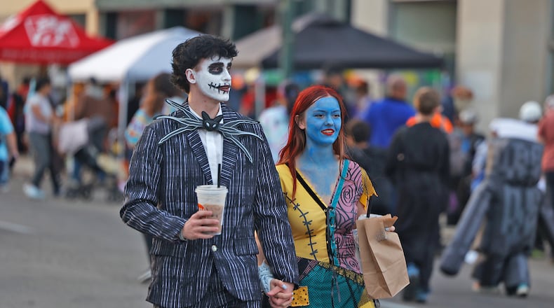 FILE - Hundreds of creepy and cute characters filled the sidewalks and streets in Springfield for last year's seventh annual Downtown Springfield Trick or Treat on Oct. 25, 2024. Clark County Beggar’s Night will be held the Saturday prior to Halloween this year on Oct. 25, 2025. BILL LACKEY/STAFF