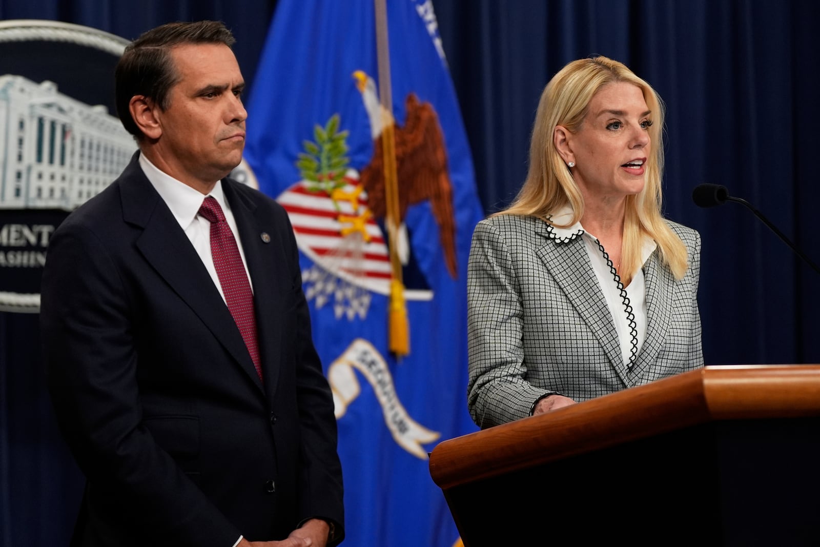 Attorney General Pam Bondi speaks as Deputy Attorney General Todd Blanche listens during a news conference about Kilmar Abrego Garcia at the Justice Department, Friday June 6, 2025, in Washington. (AP Photo/Julia Demaree Nikhinson)