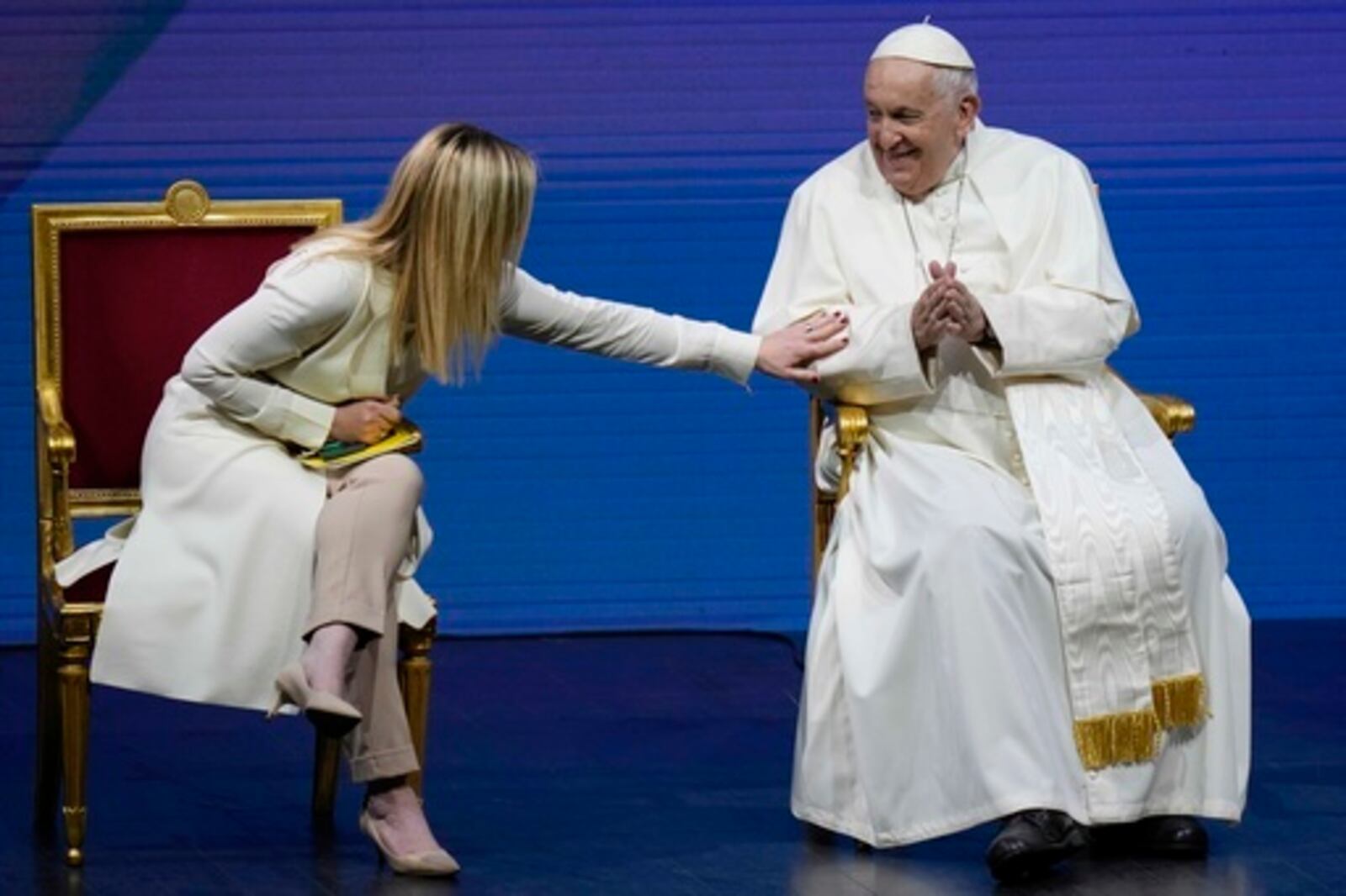FILE - Pope Francis and Giorgia Meloni attend a conference on birth rate, at Auditorium della Conciliazione, in Rome, Friday, May 12, 2023. (AP Photo/Alessandra Tarantino, File)