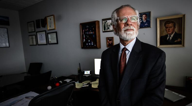 Dayton VA Director, Mark Murdock in his office at the VA Medical Center. The VA is producing monthly, "tele town halls" where the hospital invites hundreds of patients to participate on the calls to help to serve the veterans better. JIM NOELKER/STAFF