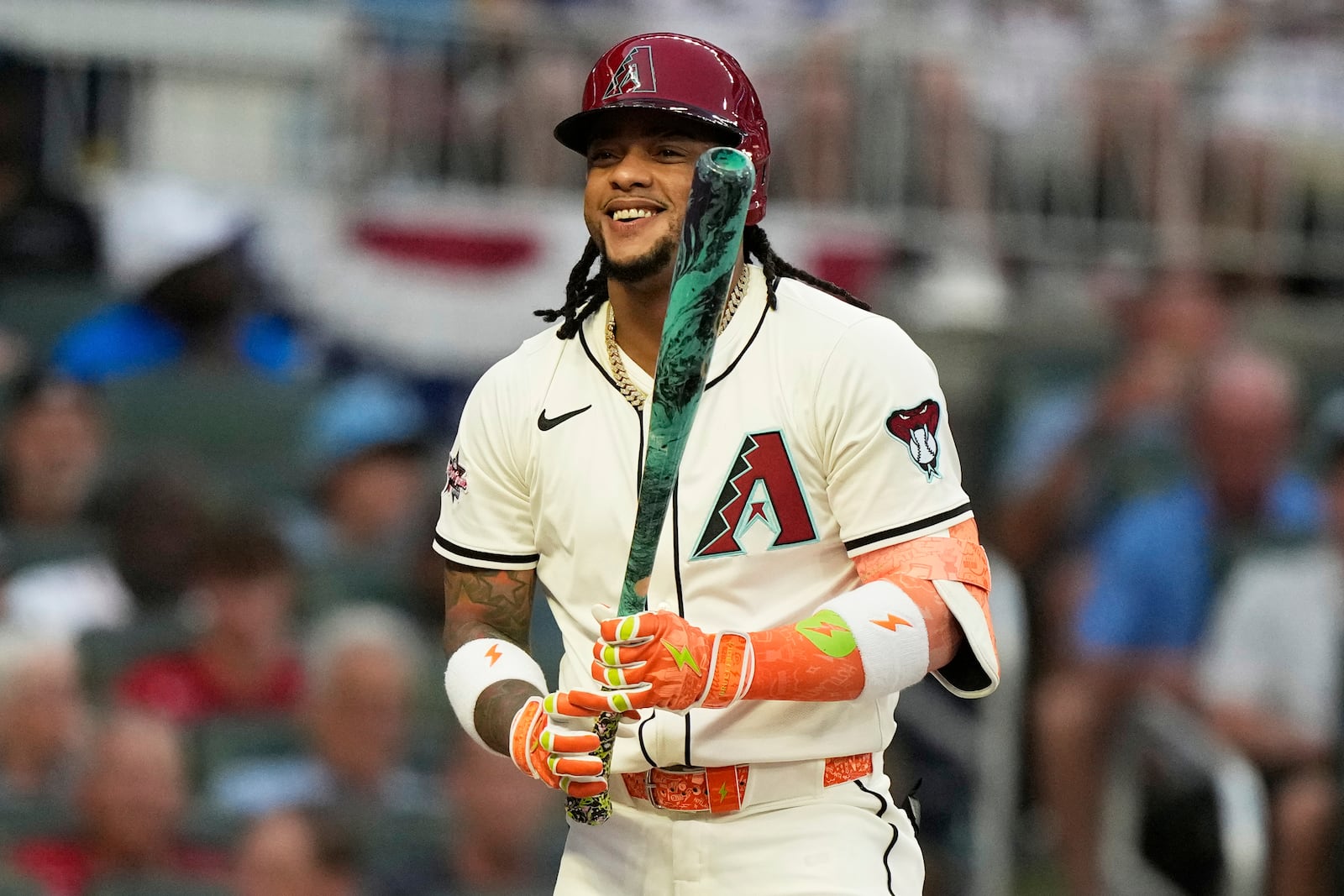 Arizona Diamondbacks' Ketel Marte smiles during first inning at the MLB baseball All-Star game between the American League and National League, Tuesday, July 15, 2025, in Atlanta. (AP Photo/Brynn Anderson)