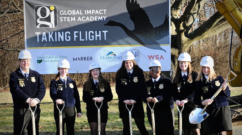 Students from Global Impact STEM Academy took part in the groundbreaking Thursday, December 14, 2023 for the new “Upper Academy” facility on Clark State College’s campus. From left, Brady Payton, Lara Rittenhouse, Sarah Waddle, Grace Whitmore, Jaiden Welliford, Josie Jennings and Allison Devanna. MARSHALL GORBY\STAFF