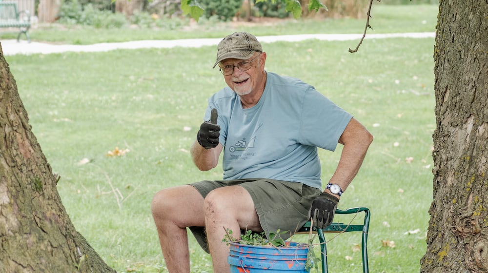 Master Gardener Volunteer Fred Miller works in Snyder Park Gardens & Arboretum in the Hydrangea Garden