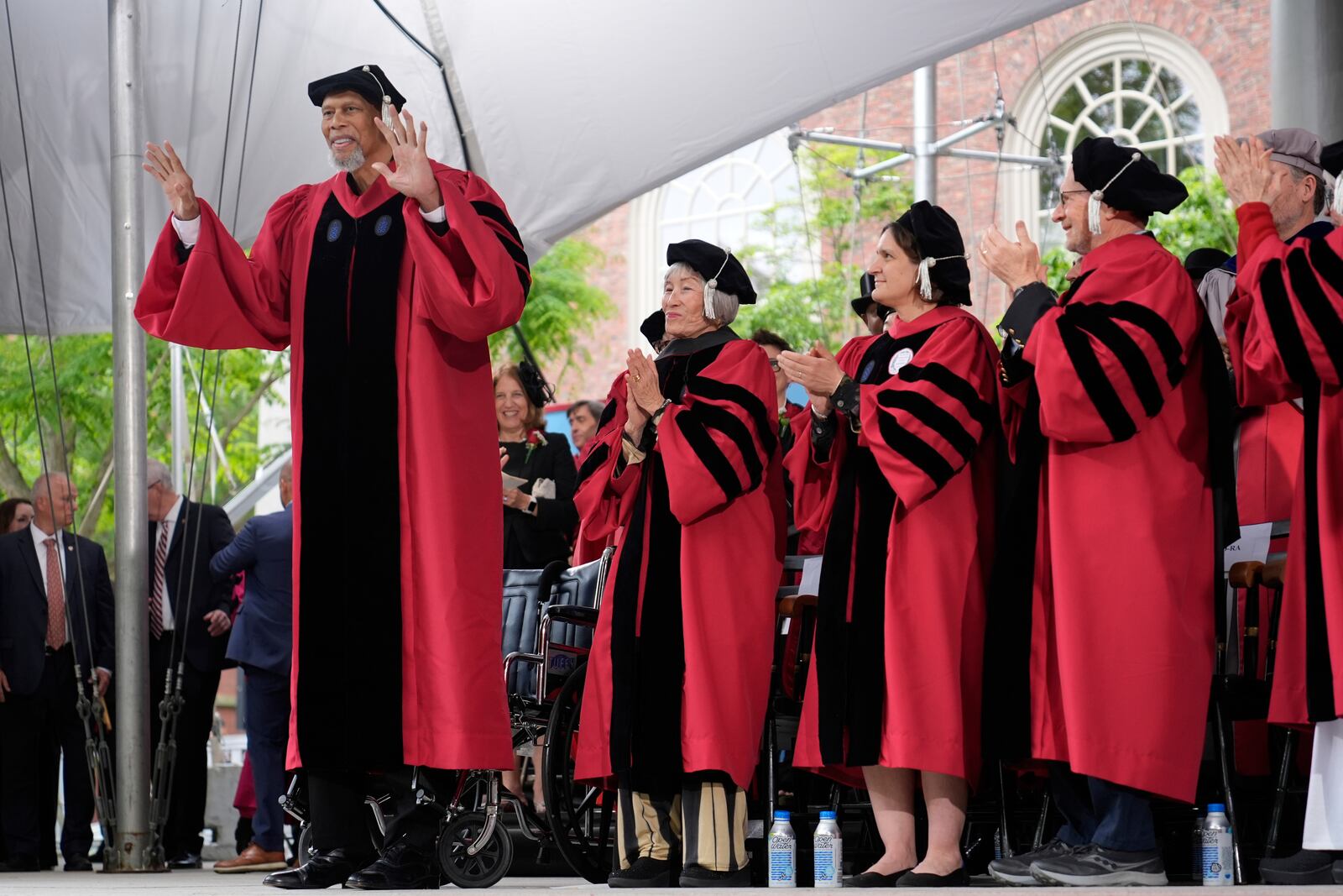 Hall of Fame center and honorary degree recipient Kareem Abdul-Jabbar acknowledges the audience applause during commencement ceremonies at Harvard University, Thursday, May 29, 2025, in Cambridge, Mass. (AP Photo/Charles Krupa)