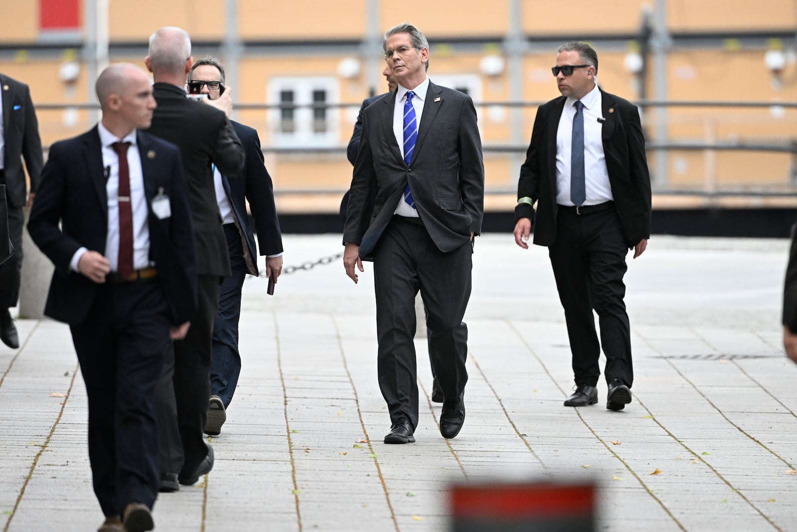U.S. treasury secretary Scott Bessent, centre, walks outside Rosenbad ahead of trade talks between the U.S. and China in Stockholm, Sweden, Tuesday July 29, 2025. (Fredrik Sandberg/TT News Agency via AP)