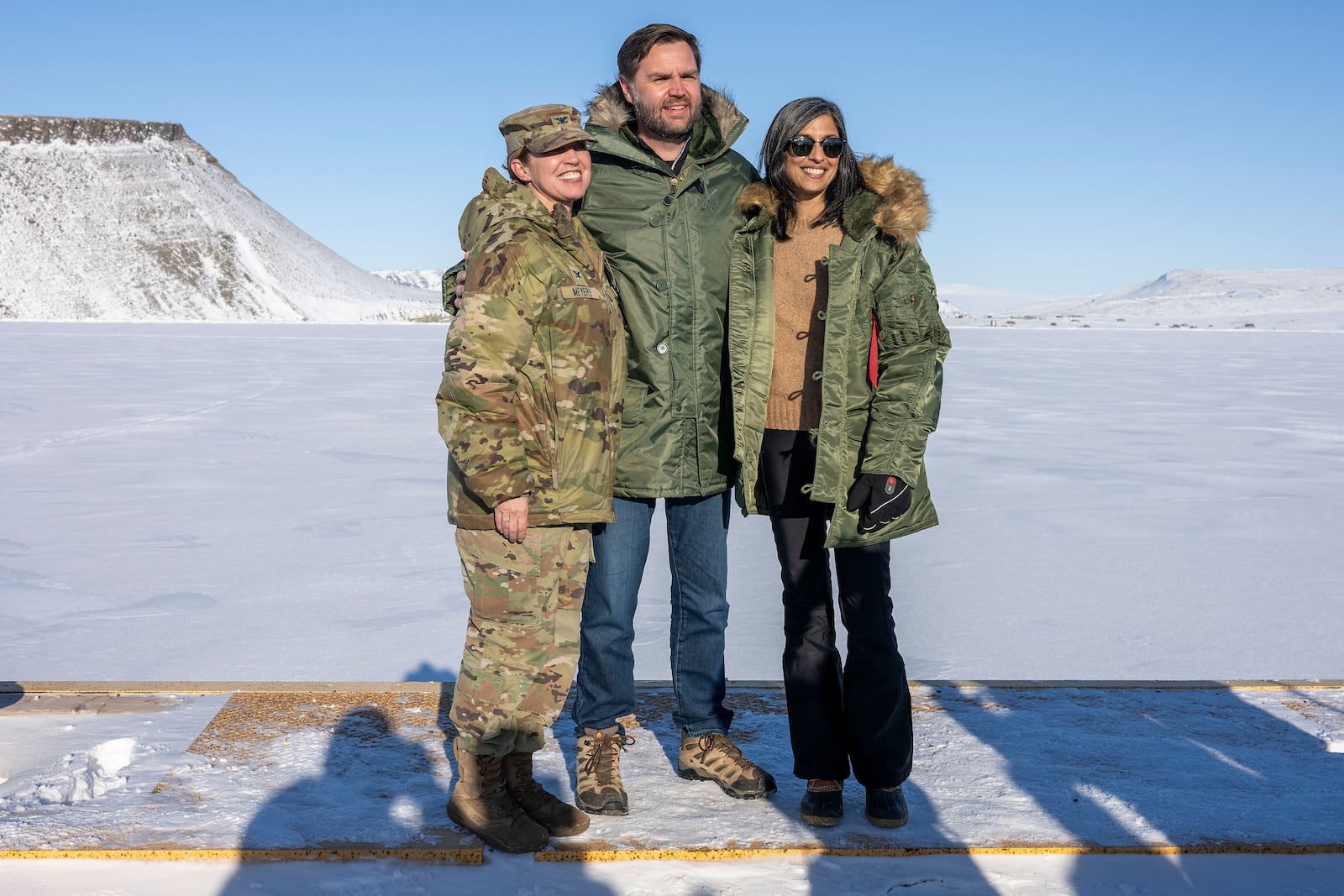 Vice President JD Vance, center, poses with Col. Susan Meyers, commander of the US military's Pituffik Space Base, left, and second lady Usha Vance as they tour the base in Greenland, March 28, 2025. (Pool via AP)