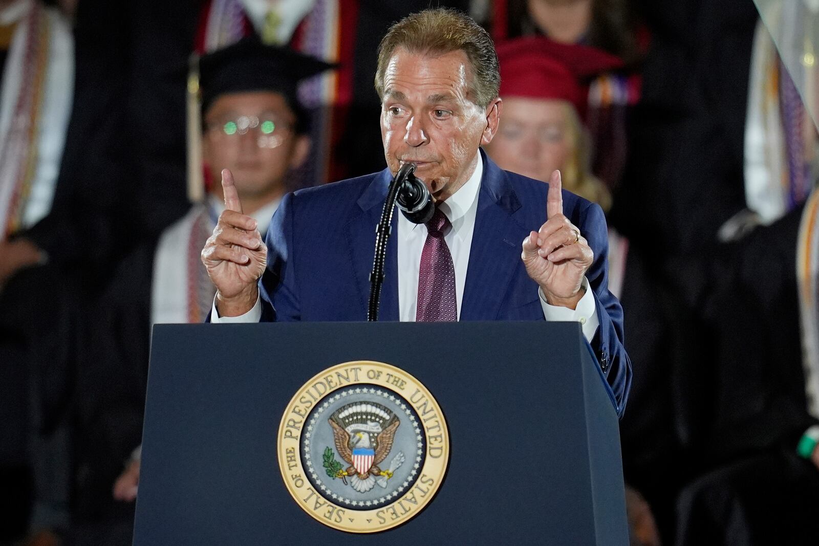 Nick Saban speaks before President Donald Trump arrives to give a commencement address at the University of Alabama, Thursday, May 1, 2025, in Tuscaloosa, Ala. (AP Photo/Mike Stewart)
