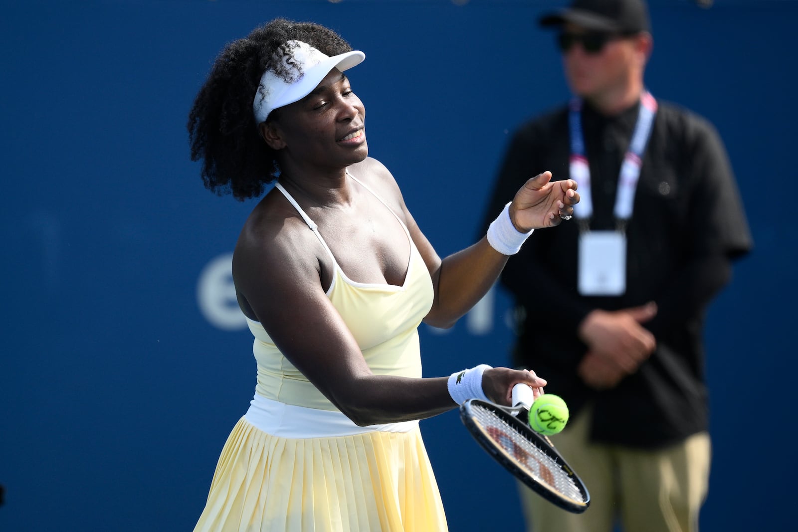 Venus Williams hits a ball toward the crowd after a doubles match with Hailey Baptiste against Eugenie Bouchard and Clervie Ngounoue at the Citi Open tennis tournament Monday, July 21, 2025, in Washington. (AP Photo/Nick Wass)
