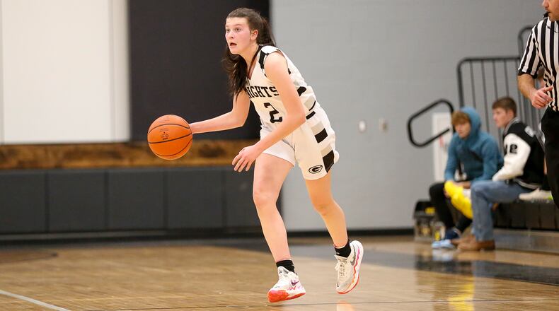 Greenon High School junior Claire Henry dribbles the ball up the floor during their game against West Liberty-Salem on Monday, Dec. 20 in Enon. CONTRIBUTED PHOTO BY MICHAEL COOPER
