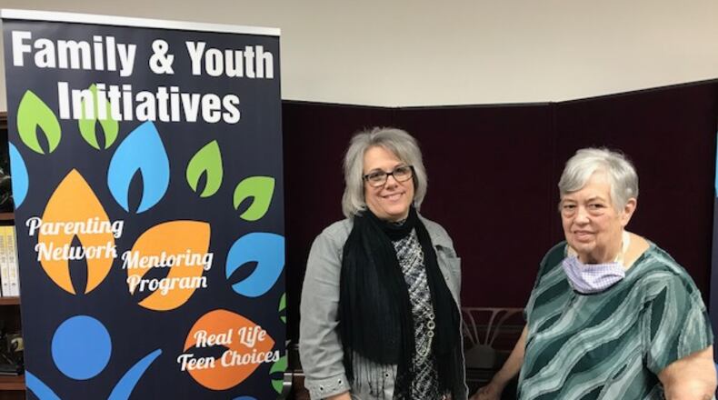 Nikki Stefanow, left, is the new executive director of Family & Youth Initiatives, replacing Pat Banaszak who has moved into an advisory role for the New Carlisle nonprofit. CONTRIBUTED