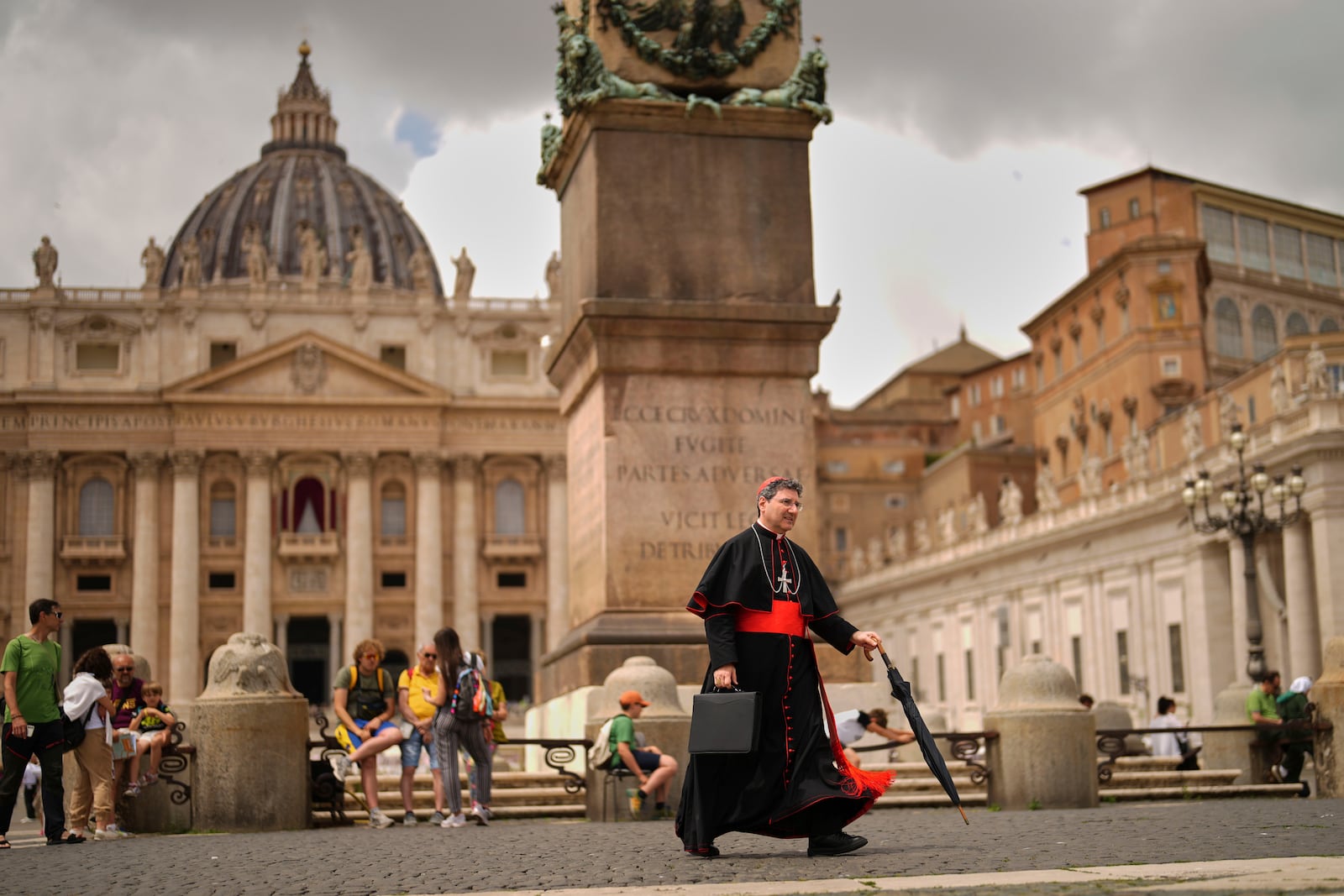 Cardinal Francis Leo walks along St. Peters square, at the Vatican, Monday, May 5, 2025, after attending the General Congregation of cardinals in the New Synod Hall where they are preparing for the upcoming conclave starting on May 7, to elect the 267th Roman pontiff. (AP Photo/Francisco Seco)