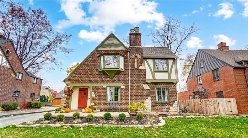 Listed for $575,000 by Sibcy Cline Realtors, this two-story home at 153 Spirea Drive in Oakwood has about 2,663 feet of living space plus a full basement finished to match the Tudor style. CONTRIBUTED