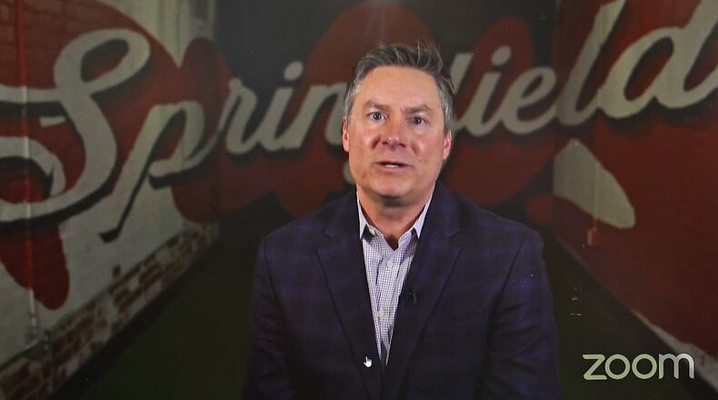 Mike McDorman talks about the Chamber's name change during an annual meeting on Thursday. BILL LACKEY/STAFF