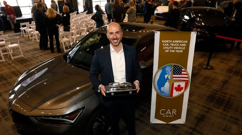 Acura National Sales Assistant Vice President Emile Korkor with the 2023 North American Car of the Year award-winning 2023 Acura Integra, in Detroit on January 11.