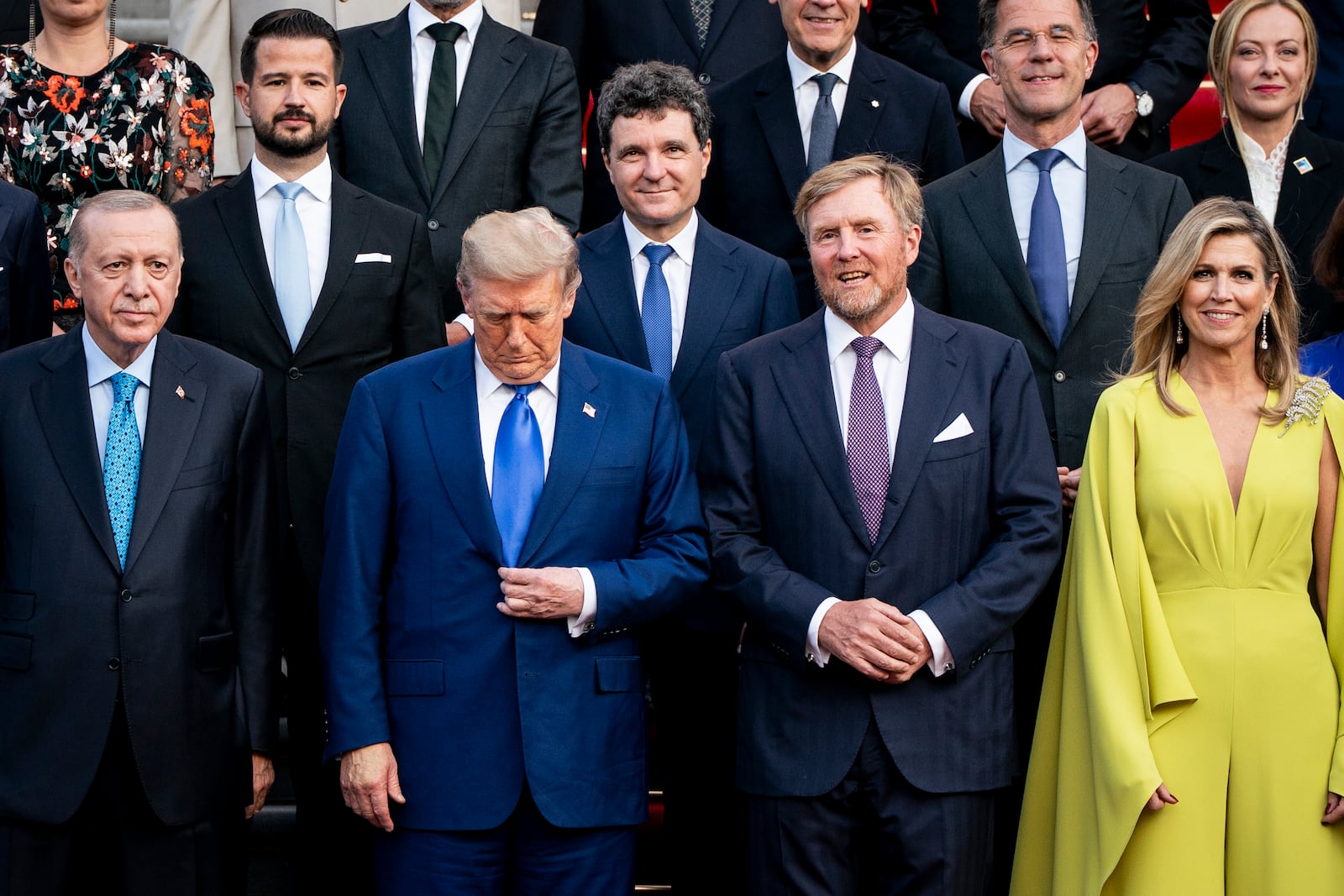 Front row from left, Turkey's President Recep Tayyip Erdogan, US President Donald Trump, King Willem-Alexander and Queen Maxima of the Netherlands, poses for a family photo at the 2025 NATO summit in The Hague, on Tuesday, June 24, 2025. (Haiyun Jiang/Pool Photo via AP)