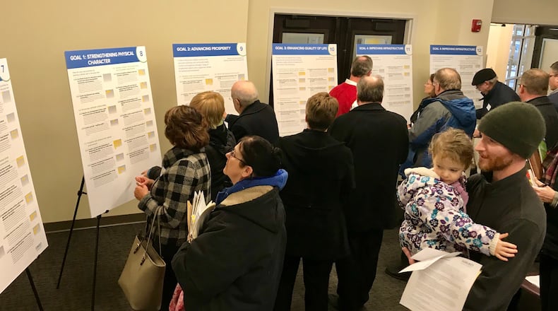 A group of Clark County residents read the draft of an updated land use plan expected to be completed in February of 2018. MICHAEL COOPER/STAFF