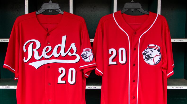 The Reds unveiled a new alternative game jersey (left) and spring training jersey for 2020. Photo courtesy of Reds