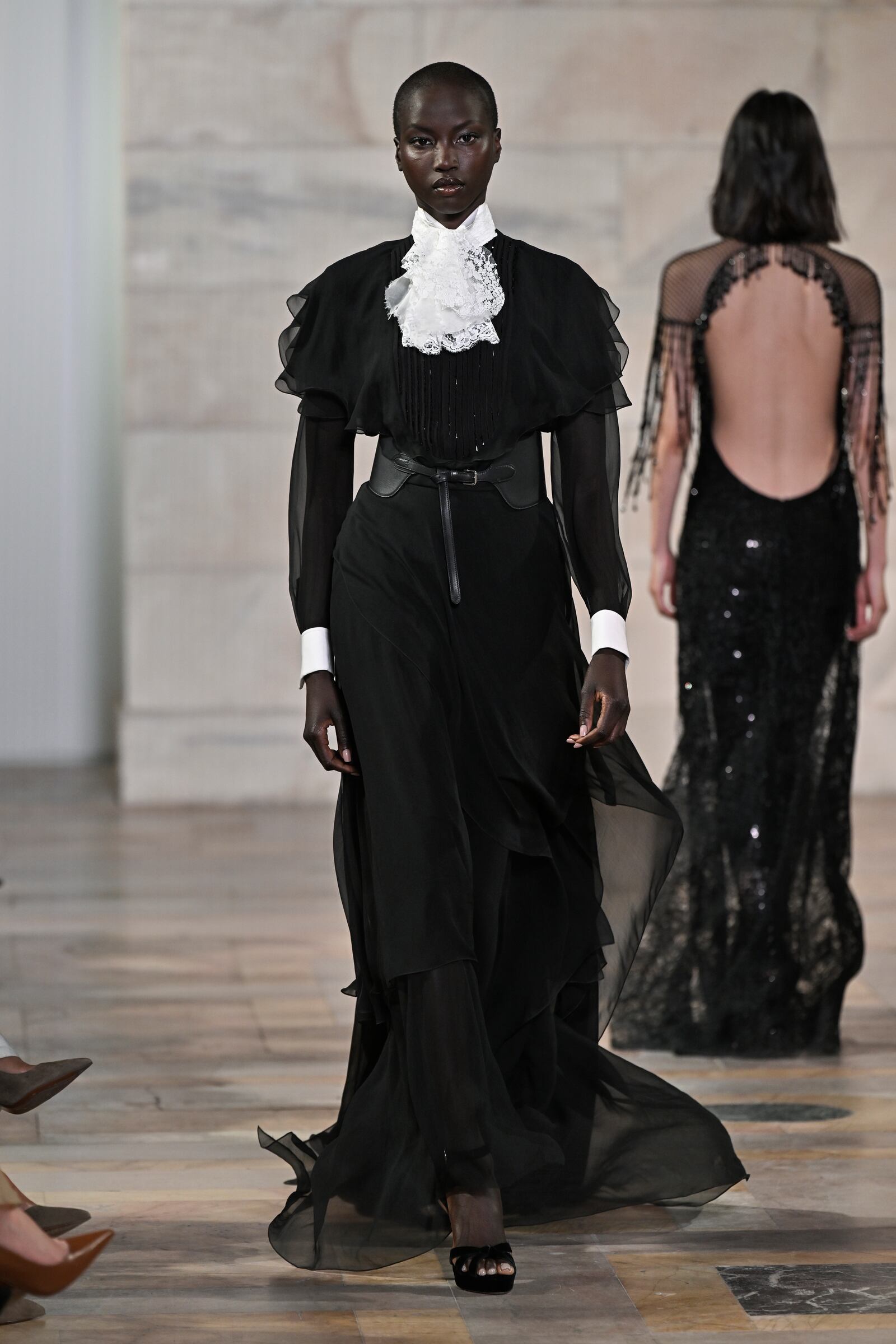 A model walks the runway at the Ralph Lauren Fall 2025 presentation on Thursday, April 17, 2025, in New York. (Photo by Evan Agostini/Invision/AP)