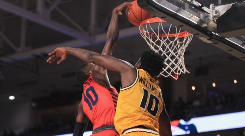 Dayton's Jalen Crutcher dunks against Virginia Commonwealth in the first half on Tuesday, Feb. 18, 2020, at the Siegel Center in Richmond, Va.