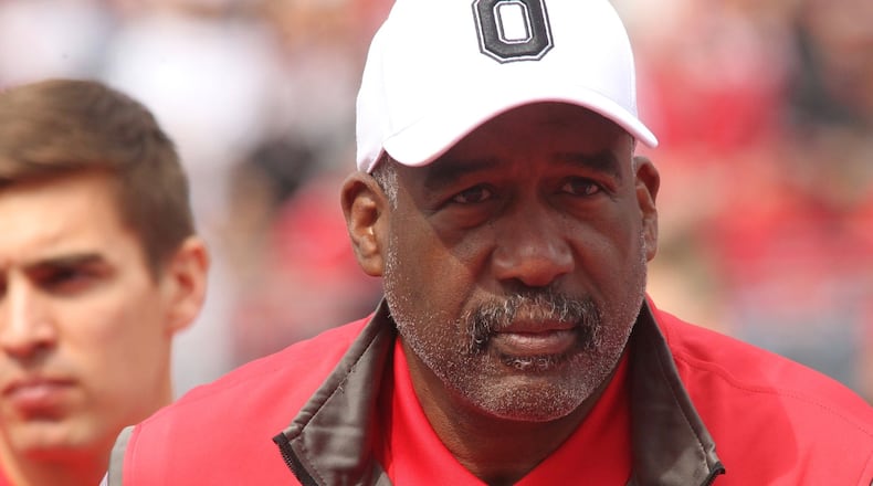 Ohio State Athletic Director Gene Smith walks across the turf before the spring game on Saturday, April 13, 2019, at Ohio Stadium in Columbus. David Jablonski/Staff