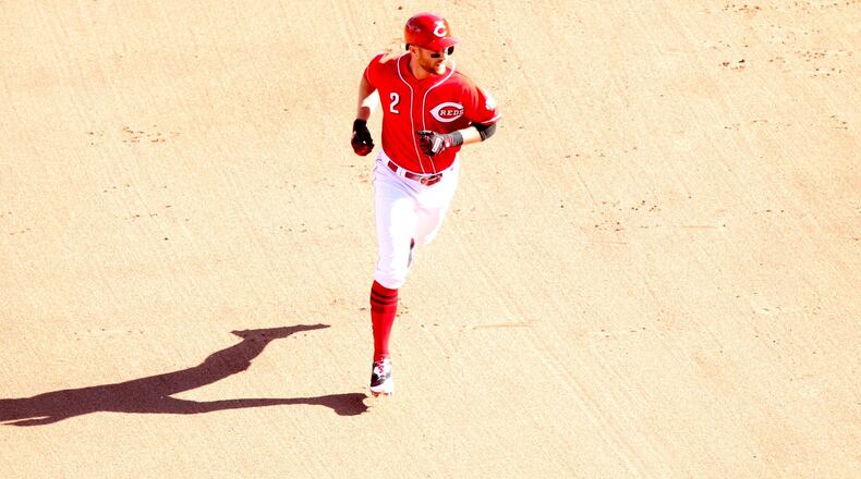 The Reds’ Zack Cozart rounds the bases after a home run against the Giants on Sunday, May 7, 2017, at Great American Ball Park in Cincinnati. David Jablonski/Staff