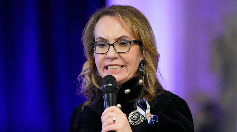 FILE - Former Arizona Rep. Gabby Giffords talks during a vigil remembering the 25th anniversary of the Columbine High School mass shooting, April 19, 2024, in Denver. (AP Photo/Jack Dempsey, File)