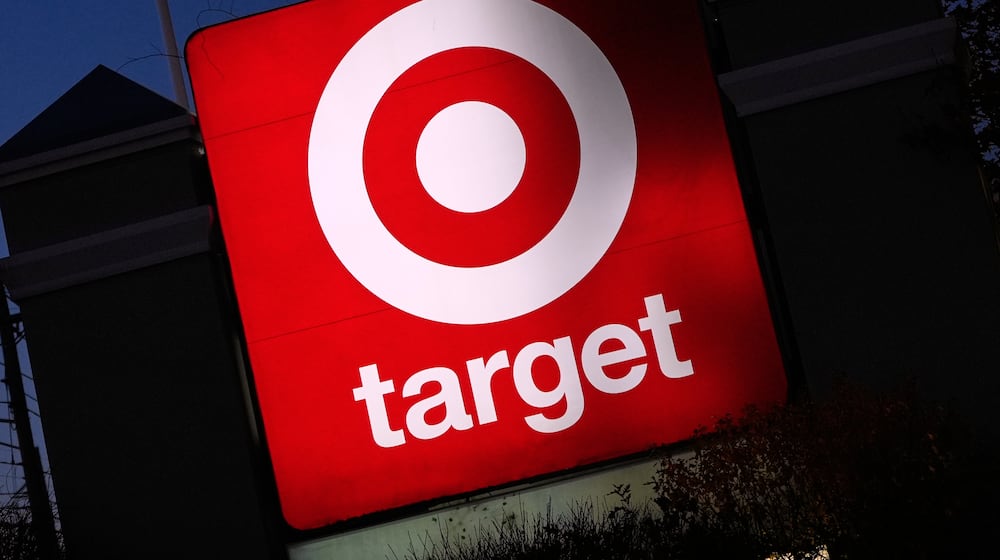 FILE - The Target logo displayed on a sign outside a store, Nov. 18, 2025, in Salem, N.H. (AP Photo/Charles Krupa, File)