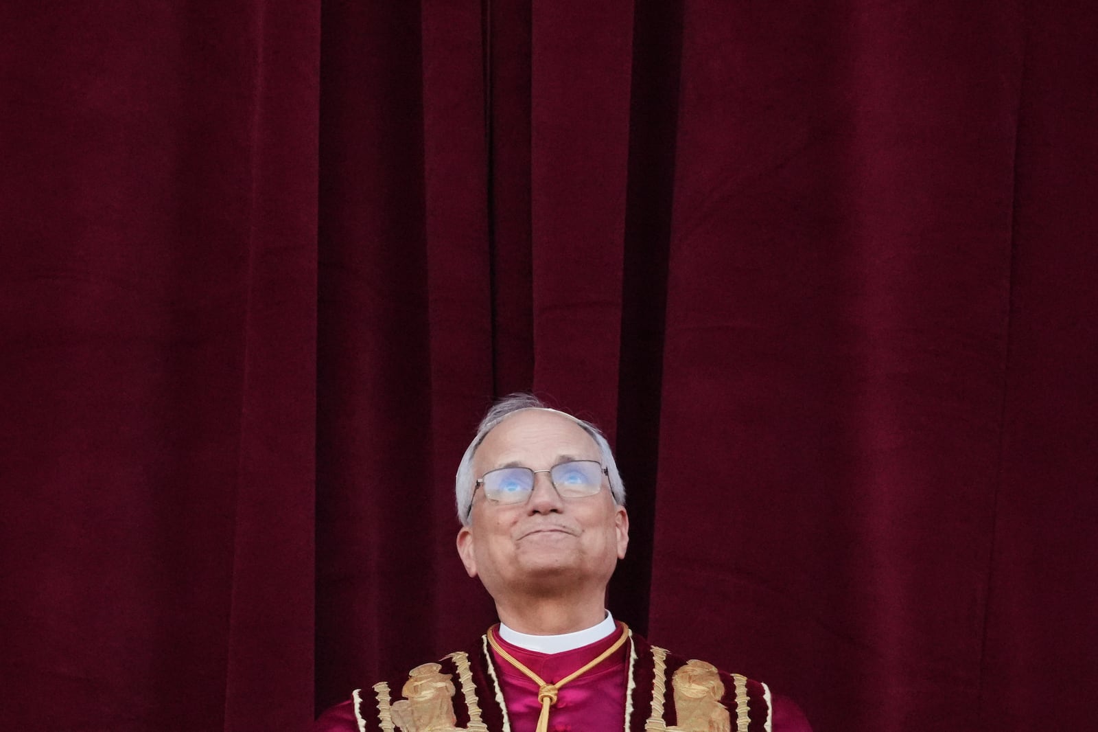 Newly elected Pope Leo XIV appears at the balcony of St. Peter's Basilica at the Vatican, Thursday, May 8, 2025. (AP Photo/Alessandra Tarantino)