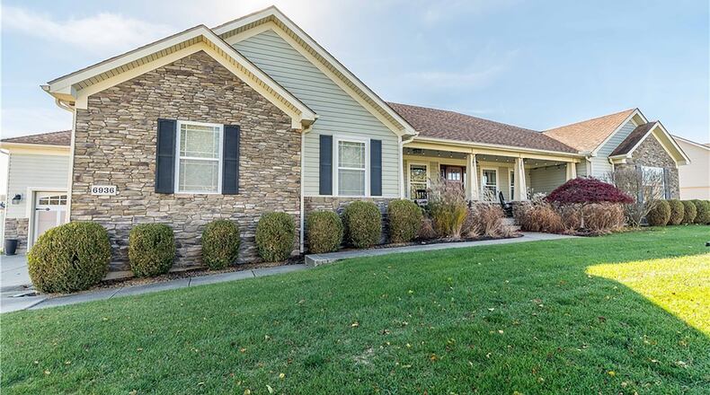 This custom built Huber Heights home was built in 2010 and sits on slightly more than a half acre lot. It has a covered front porch and a finished basement. CONTRIBUTED