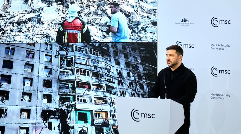 Ukraine's President Volodymyr Zelenskyy addresses the audience during a session at the Munich Security Conference in Munich, Germany, Saturday, Feb. 14, 2026. (AP Photo/Michael Probst)