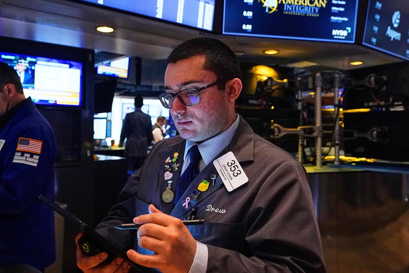 Trader Drew Cohen works on the floor of the New York Stock Exchange, Thursday, May 8, 2025. (AP Photo/Richard Drew)
