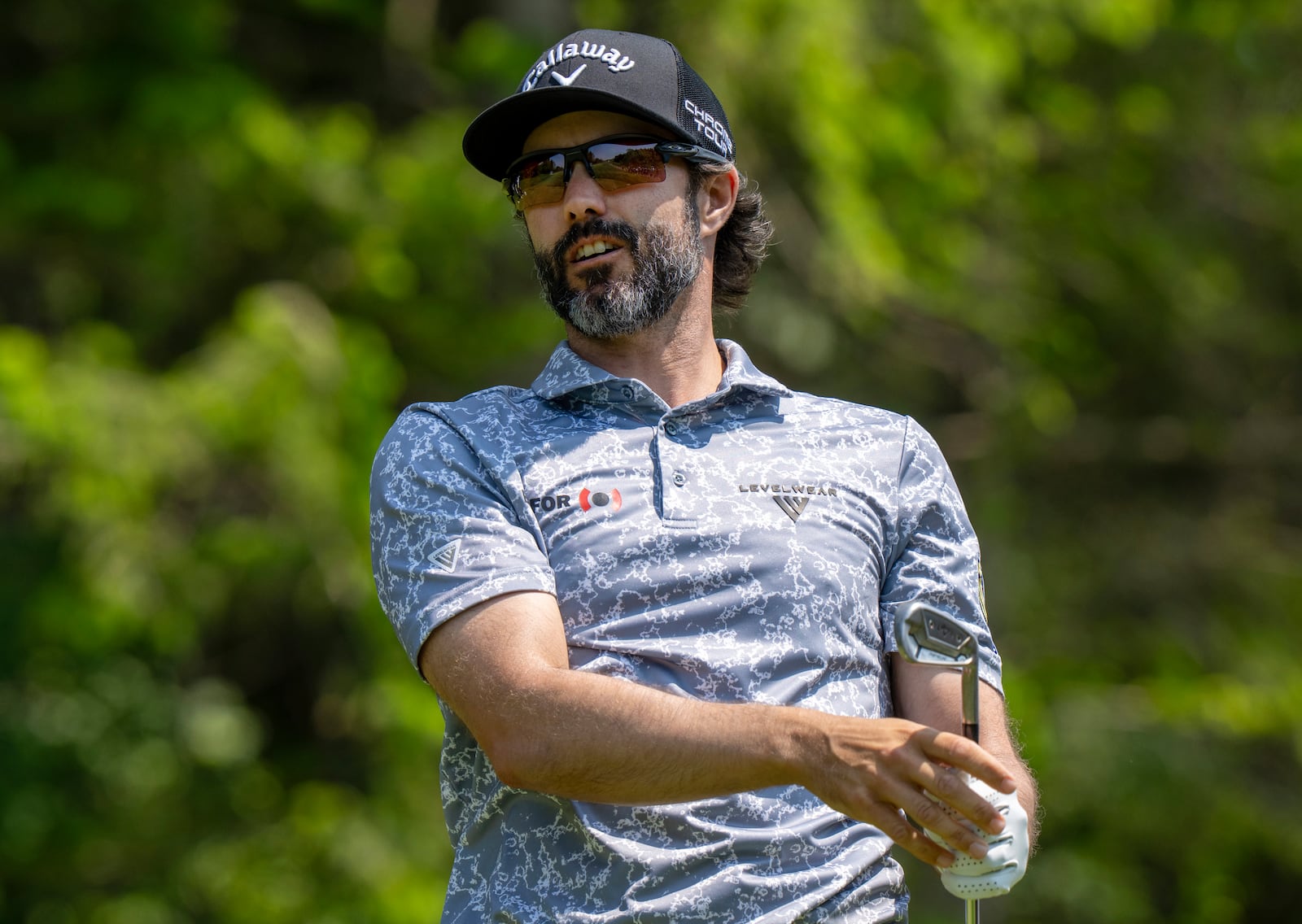Canada's Adam Hadwin watches his tee shot on the 11th hole during the third round of the Canadian Open golf tournament in Caledon, Ontario, Saturday, June 7, 2025. (Frank Gunn/The Canadian Press via AP)